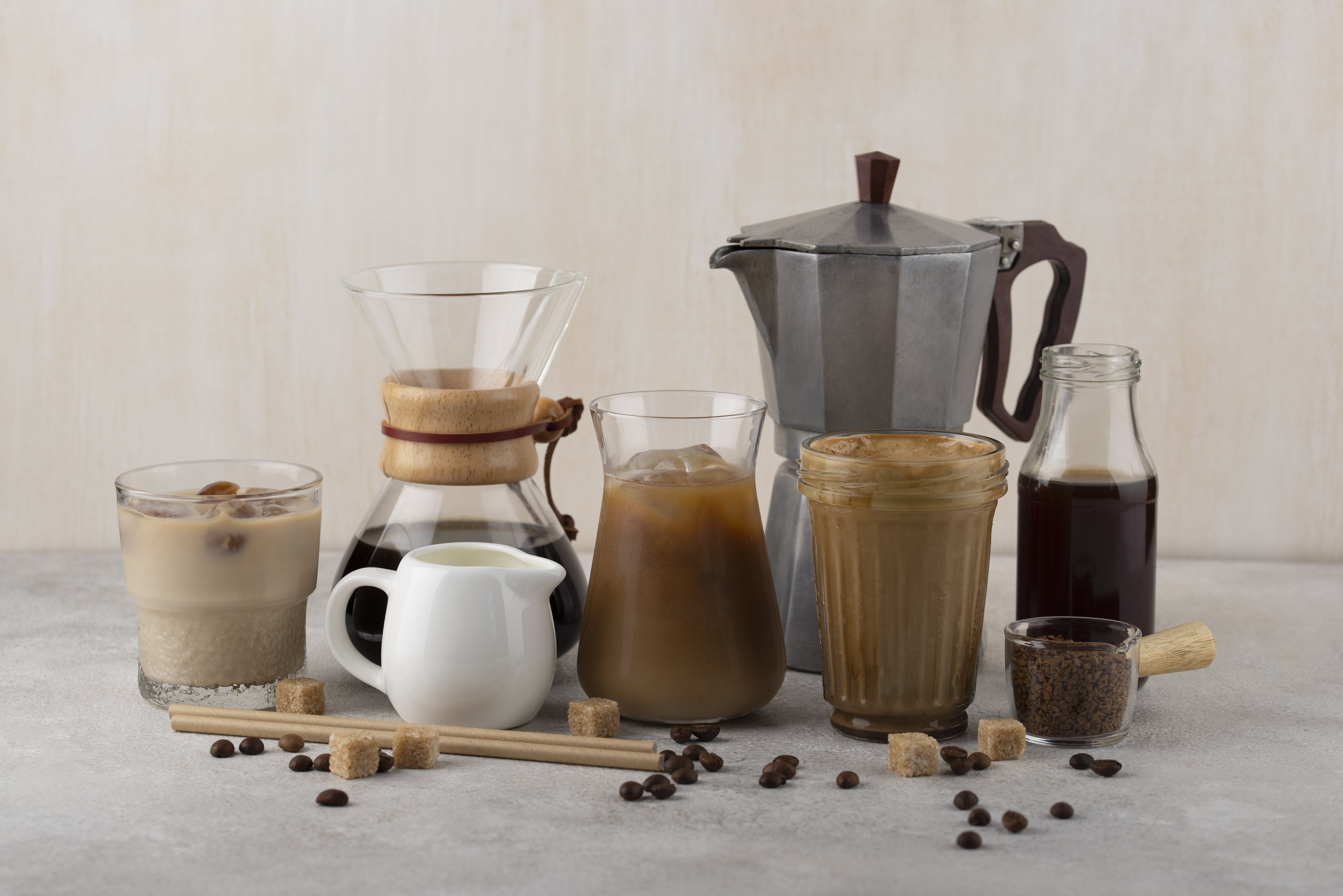 Cups and glasses of coffee showing Black Crown Coffee Co’s versatile blends for espresso, latte, and frappe